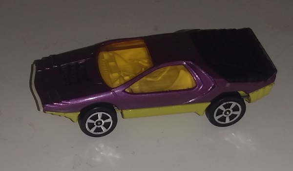 CORGI JUNIOR PURPLE WITH BLACK TAIL PLATE AND YELLOW WINSHIELD