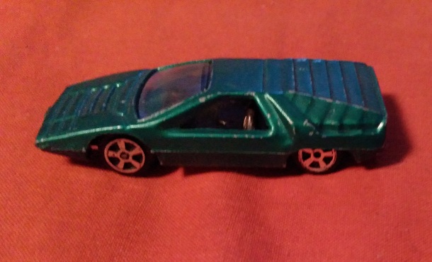 TINS TOYS DARK GREEN CARABO BERTONE T216