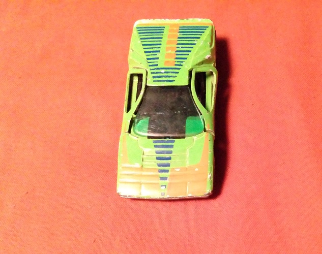 GREEN WITH ORANGE AND BLUE HOT WHEELS CARABO