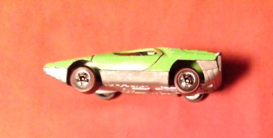 GREEN WITH ORANGE AND BLUE HOT WHEELS CARABO