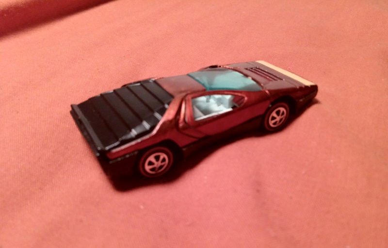 ORANGISH RED HOT WHEELS CARABO