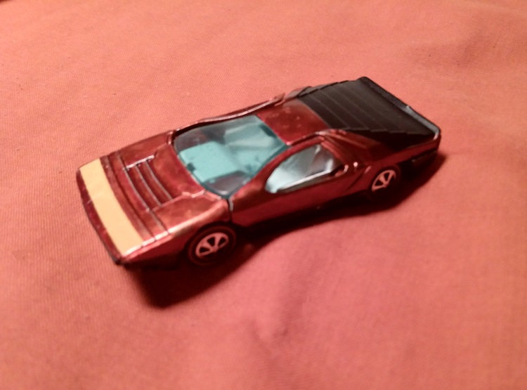 ORANGISH RED HOT WHEELS CARABO