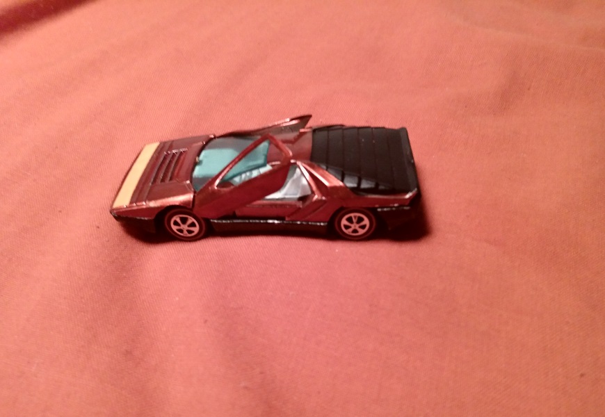 ORANGISH RED HOT WHEELS CARABO