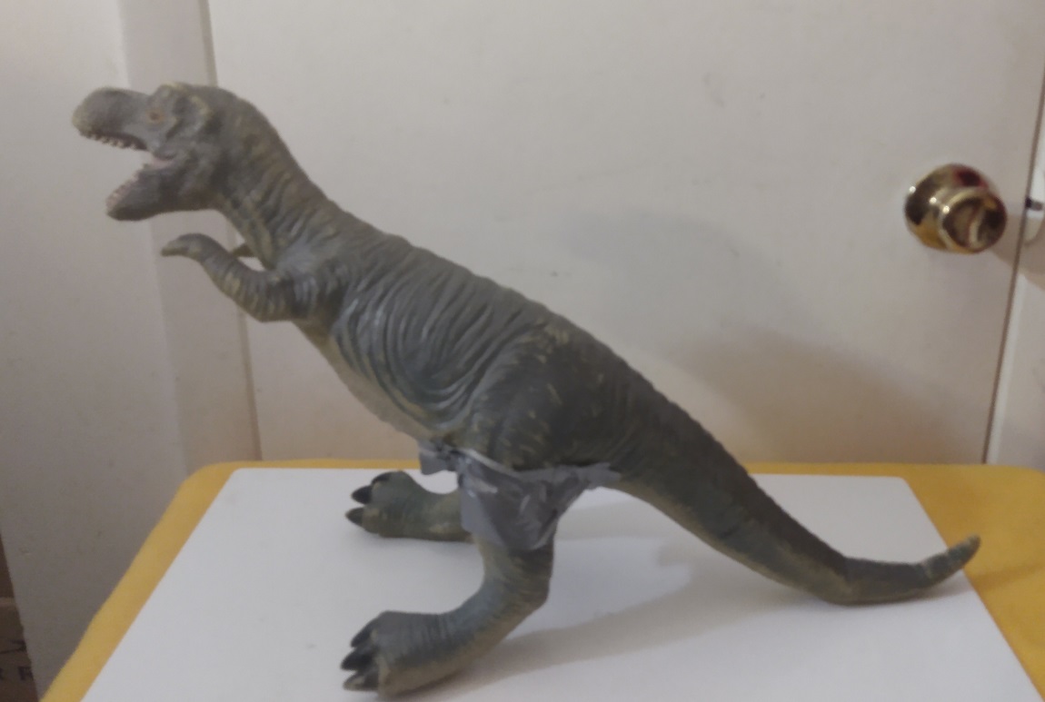 DINOSAUR WITH LEGS DUCT TAAPED ON