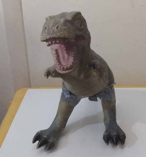 DINOSAUR WITH LEGS DUCT TAAPED ON