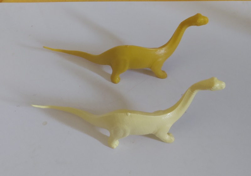 TWO YELLOW MARX BRONTOS