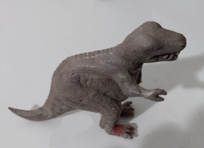 RED FOOT OF MARBLED LARGE MARX TYRANNOSAURUS REX