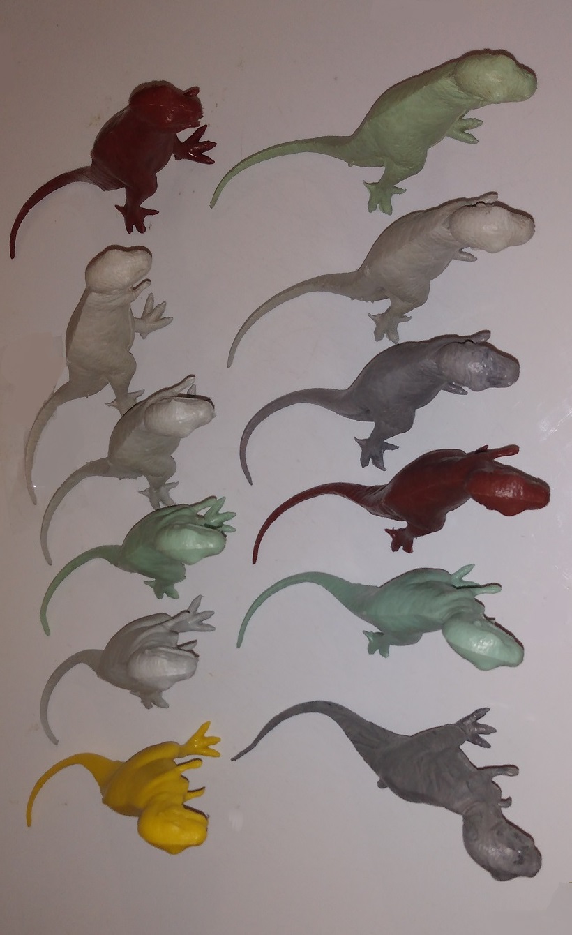 DOZEN MARX TYPE TWO TYRANNOSAURS REX
