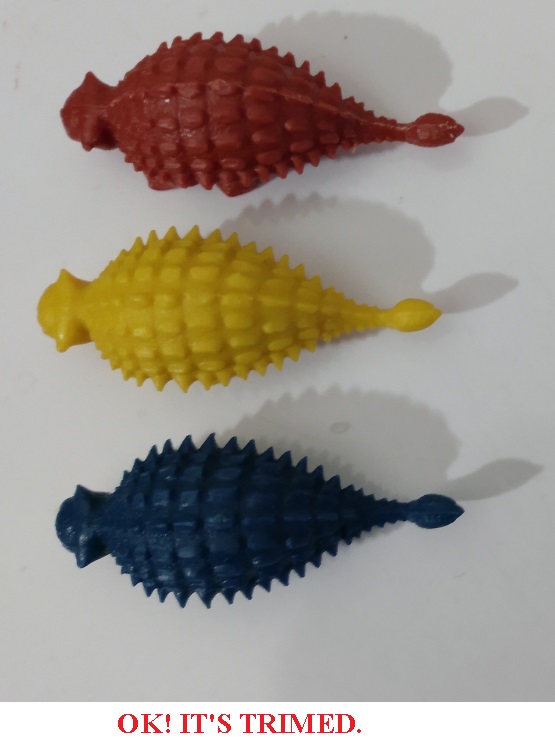 TRIMMED PICTURE WITH THREE MARX ANKYLOSAURUS FIGURES