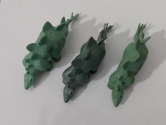 THREE DIFFERENT COLOR GREEN MARX STEGOSAURUS