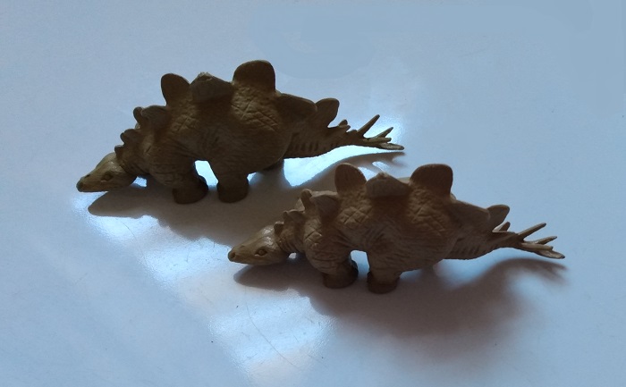 TWO TAN MARX STEGOSAURUS