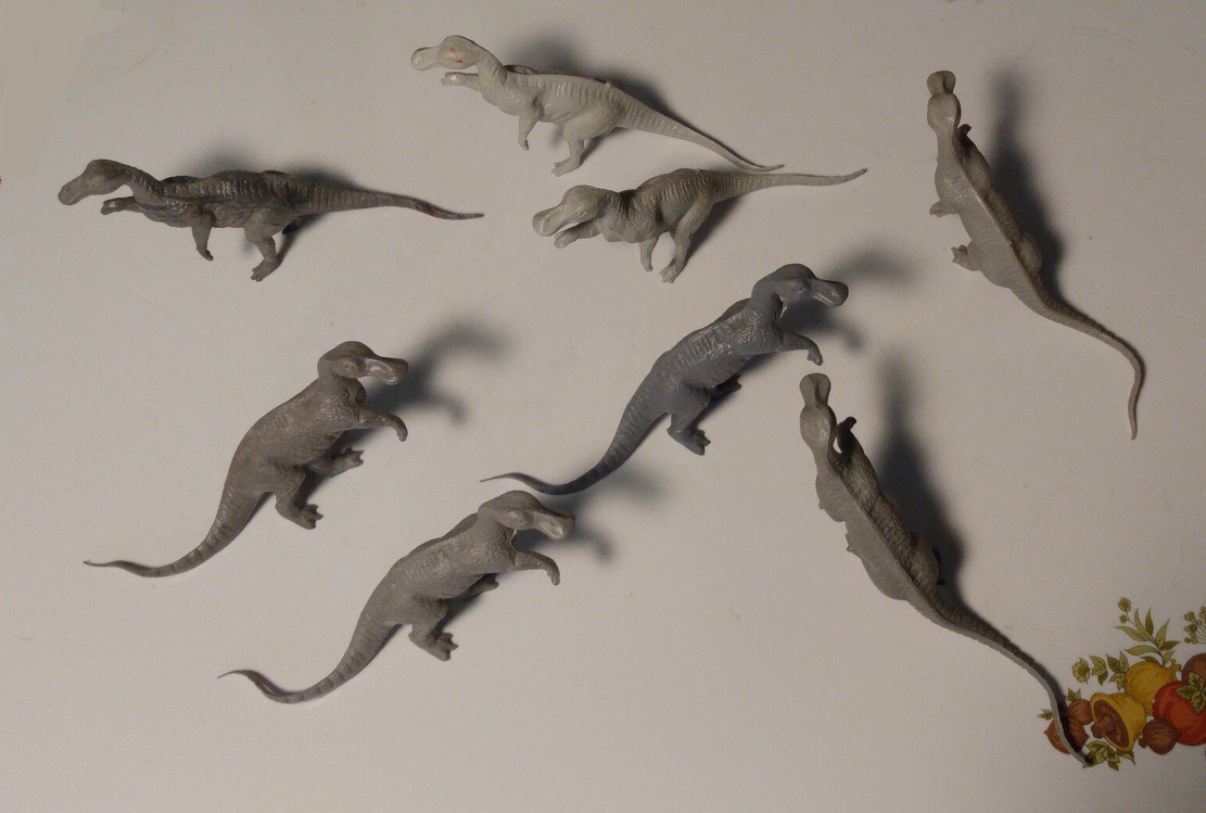 EIGHT GRAY TRACHODONS