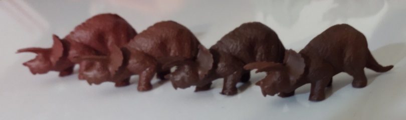 FOUR BROWN TRICERATOPS