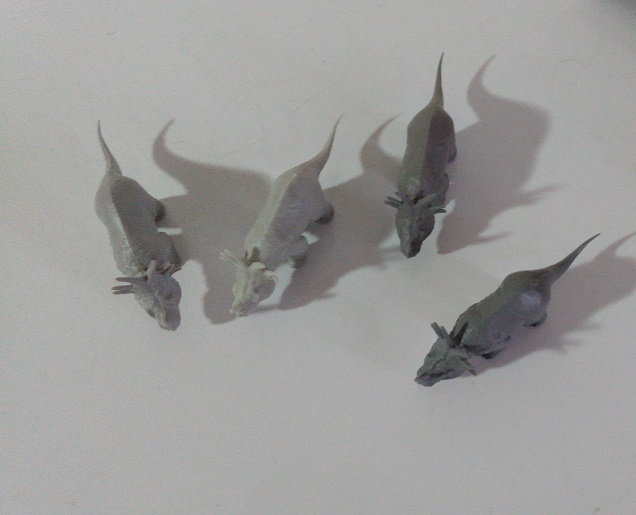 FOUR GRAY STYRACOSAURUS