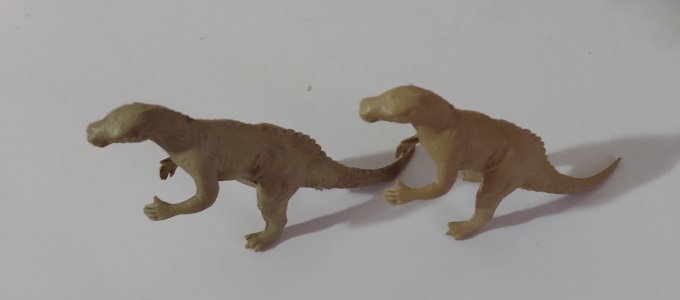 TWO TAN MARX IGUANODON