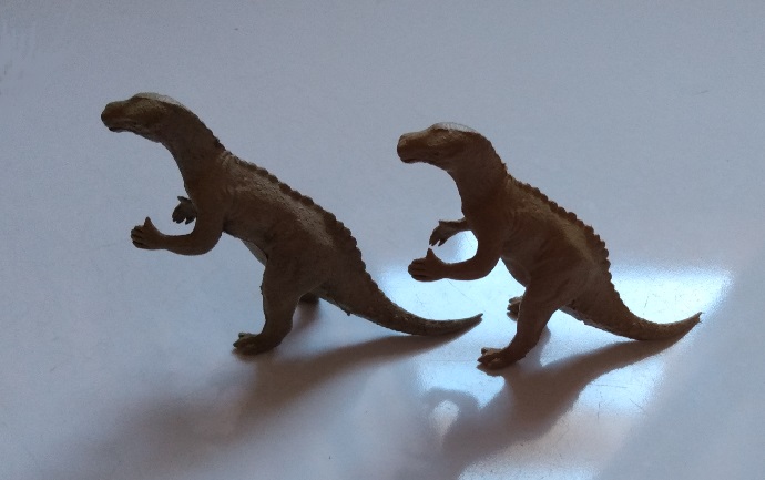 TWO TAN MARX IGUANODON
