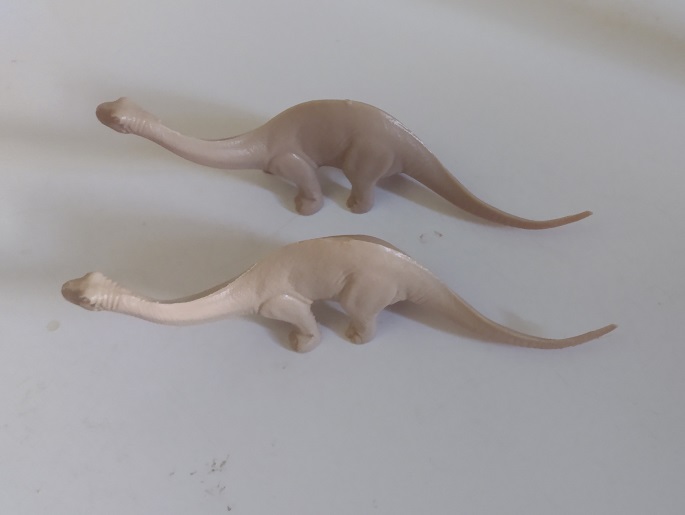 TWO SDC BRONTOSAURUS IN DIFFERNT SHADES O TAN