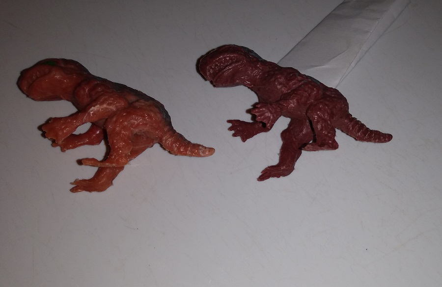 WHITE POST PSITTACOSAURUS LYING ON BACKS