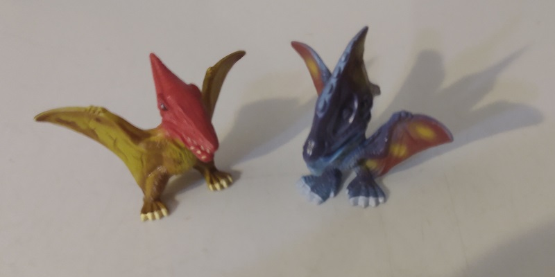 TWO DINO FROZ FLYING CREATURES