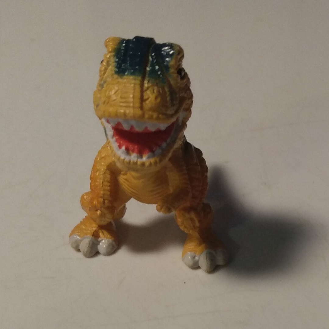 BABY TYRANNOSAURUS SMILING AT THE CAMERA