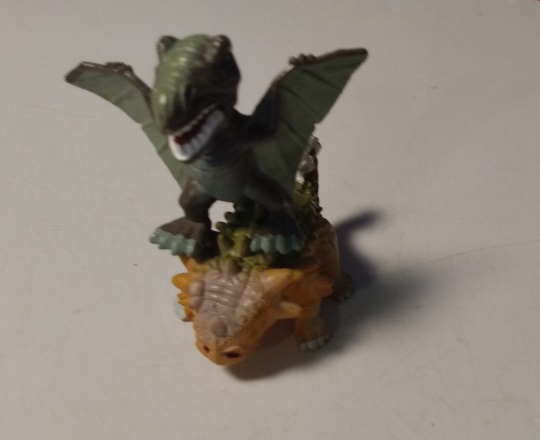 FLYING DINOSAUR RIDING AN ANKYLOSAURUS