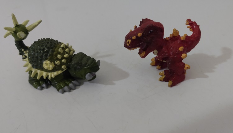 TWO DINO FROZ DINOSAURS