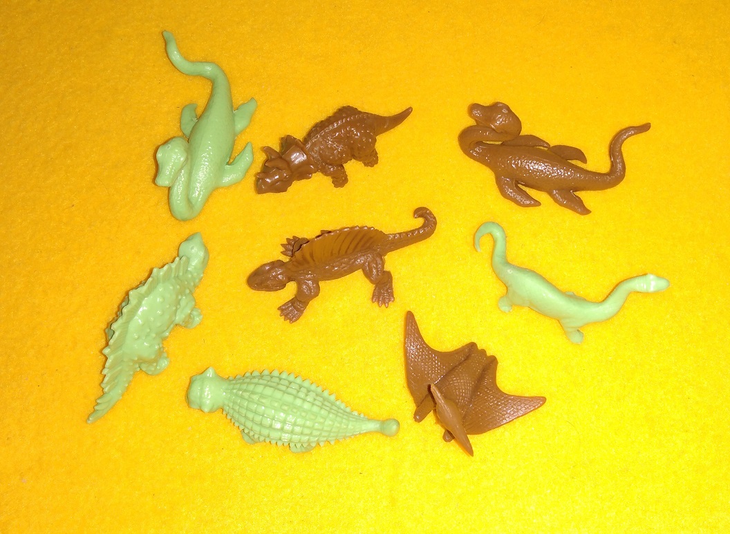 TOPPS GREEN AND BROWN DINOSAURS