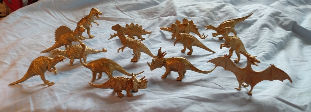 GROUP PICTURE OF GOLD DINOSAURS