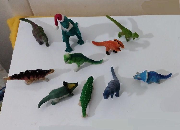 VARIOUS FLOCKED DINOSAURS