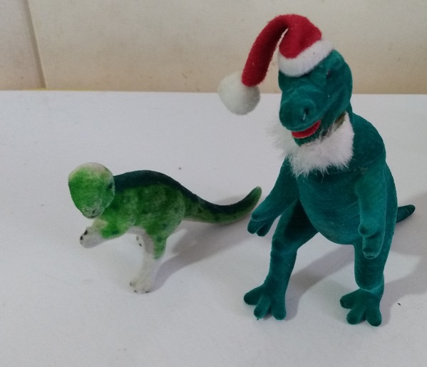 TWO FLOCKED DINOSAURS