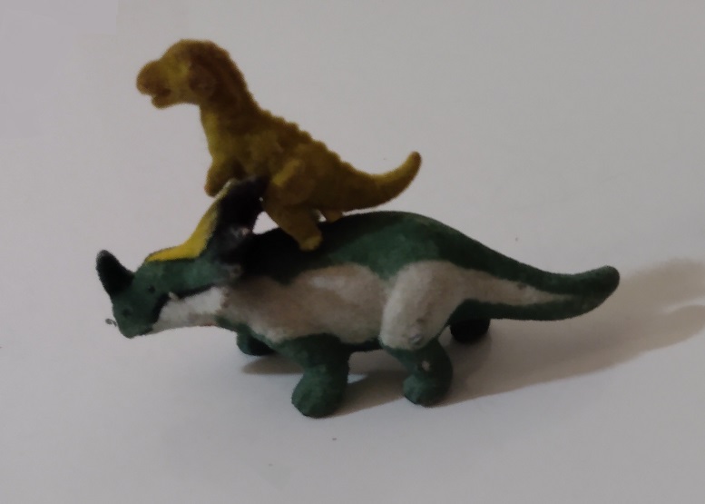 LITTLE GUY RIDING A BIG TRICERTOPS