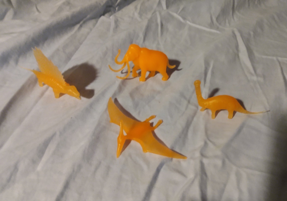 TRANSLUCENT ORANGE DINOSAURS