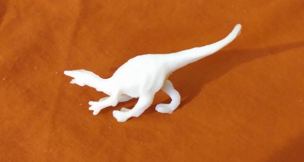 SMALL WHITE DINOSAUR