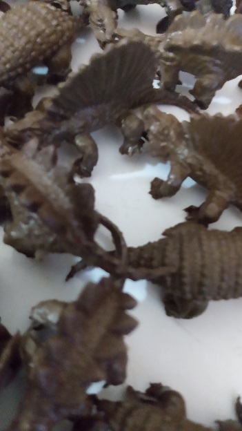 SMALL BROWN DINOSAURS