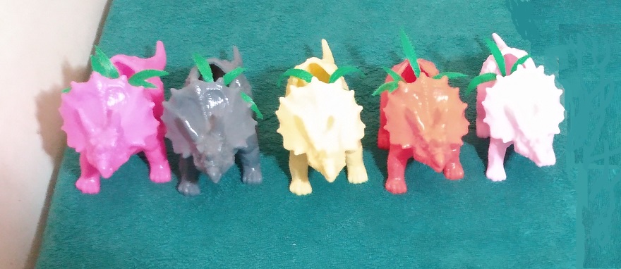 TRICERATOPS PLANTERS WITH PLASTIC PLANTS