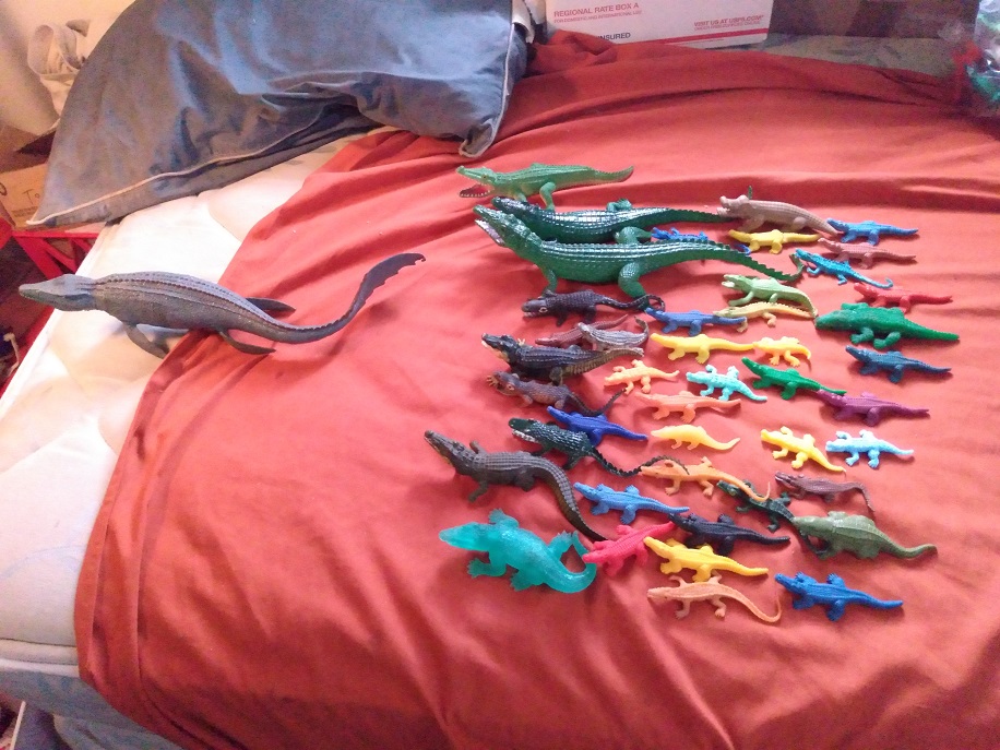 GATORS AND CROCS CROWD FORCING AWAY MOSASAURUS